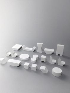 several white objects are arranged in the shape of squares, circles and rectangles