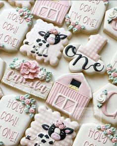 decorated cookies with farm animals and names on them