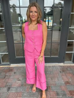 Adorable pink high waisted wide leg pants with a hidden zipper and clasp. Model is 5'4" with a 28" waist, 34" bust, and 35" hips wearing a small. Pink Straight Leg Pantsuit For Spring, Pink High Waist Pantsuit For Work, Pink Wide Leg Pants With Pockets For Summer, Fitted Pink Pantsuit For Summer, Pink High Waist Wide Leg Pants For Summer, High Waist Pink Wide Leg Pants For Summer, Sleeveless Pink Pantsuit For Spring, Pink Sleeveless Pantsuit For Work, Fitted High Waist Pink Wide Leg Pants