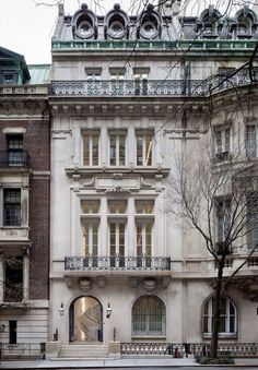 an old building with many windows and balconies