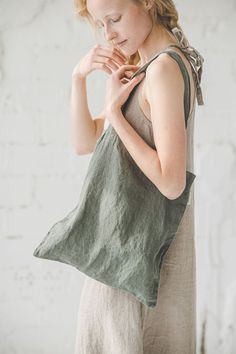 "DETAILS *Multi functional bags - never enough! *Linen bags will assist you while shopping, preparing for the beach, adding lunch for a work, etc. *These bags are suitable as a gift bag too *Made from soft wash medium weight (185 g) 100 % European linen fabric *Color - sage green. Available in 11 colors. Please choose another color on the right *Handmade in Lithuania by creative tailors CARE LABEL * machine wash gentle (40 C/104 F) * dry gentle on low heat * wrinkles give the character so there Everyday Tote Bag With Adjustable Straps, Eco-friendly Everyday Beach Bag, Eco-friendly Everyday Gift Bags, Eco-friendly Summer Bags With Pockets, Everyday Rectangular Canvas Bag With Adjustable Straps, Versatile Summer Bags With Adjustable Straps, Casual Green Lunch Bag For Everyday Use, Everyday Green Shoulder Bag With Adjustable Straps, Green Rectangular Shoulder Bag With Adjustable Straps