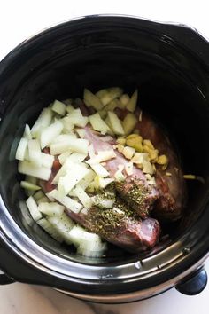 the food is being cooked in the slow cooker