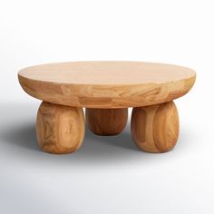 a round wooden table with two small stools on each side and one foot in the middle