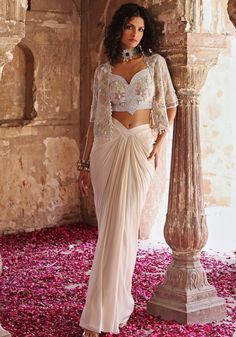 Ivory Draped Skirt Seema Thukral - Fabilicious Fashion Ivory Drapes, Sangeet Outfit, Lehenga Blouse Designs, London College Of Fashion, Ready To Wear Saree, Indian Wedding Wear, Embellished Jacket, Ghagra Choli, Draped Skirt