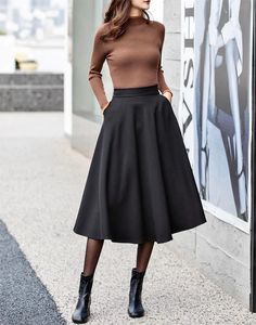 "Classic black skirt，Never go out of style，Lean and versatile. simple and elegant style suits wearing every occasion, working, shopping, weekend..soft and breathable fabric will let you act freely. Wear them with your favorite tops, such as short sleeves, suspenders, coats, and shirts...etc DETAILS: * 90% cotton, others are polyetser * Polyester lining * Two side pockets * Right zipper closure * High waistband * Elastic back waist * Black Circle skirt * Retro skirt * Perfect for spring and summer * Learn More about the items From the FAQs on the page bottom * The model is 170cm (5′7″) tall with a 80cm (31.5\") bust, 66cm (26\") waist. She is wearing in size XS. CUSTOM MADE SERVICE If you * Change other color * Can't find your size in our size Chart * Change the length * Your Height is not Circle Skirt Work Outfit, Black Skirt Combination, Black High Waisted Skirt Outfit, Gored Skirt Outfit, Black Winter Skirt Outfit, A Line Work Skirt, Styling A Line Skirt, Black Skirt Women, Full Circle Skirt Outfit