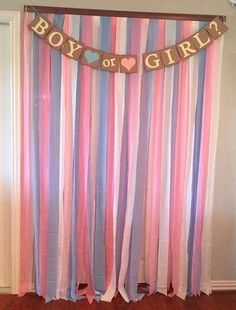 a pink, blue and purple striped curtain with the word boy or girl on it