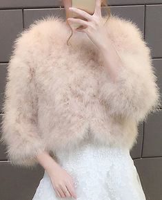 $99.90 - Beautiful White Cream Beige faux fur winter jacket (also for cold spring and autumn). This cute jacket is good for a fashion trendy street style look. For women, teens and ladies. Can be used for casual daily every day wear. Party Faux Fur Outerwear In Mink, Fluffy Faux Fur Outerwear For Spring, Chic Fluffy Fur Coat For Spring, Elegant Cream Faux Fur Coat, Elegant Long Sleeve Fur Coat With Faux Fur Lining, Chic Fluffy Fur Coat, Spring Fluffy Faux Fur Coat, Elegant Winter Fur Coat With Feather Trim, Elegant Fluffy Winter Outerwear