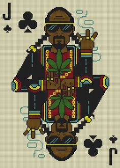 a cross stitch pattern with a man in a suit and sunglasses holding a card that says king of spades