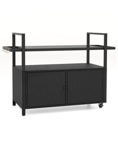 an outdoor entertainment center with black wicker and metal frame, one shelf on wheels