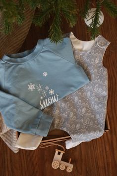 Let it snow - this Christmas shirt with snowflakes is perfect for cold winter days and a lovely festive sweater! You can choose from 6 beautiful fabric colours. You can also combine the colour of the font/motif as you wish. (Here in the example: white writing on blue fabric and white writing on grey fabric) The shirt is made from a soft sweat fabric made from organic cotton. The raglan sleeves are particularly comfortable and make it very easy to put on and take off. Materials: 95% organic cotton (kba), 5% elastane (fabric, cuffs & sewing thread are GOTS certified) Lettering/motif: flexible textile film Care instructions: Machine wash at max. 30 degrees (preferably inside out), not suitable for tumble drying! , iron inside out on low heat Let It Snow, Kids Sweatshirt, Grey Fabric, Blue Fabric, Christmas Outfit, Christmas Shirts, Beautiful Fabric, Fabric Color, Christmas Sweaters