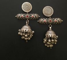 These earrings effortlessly capture the rich cultural heritage of Mughal jewelry, known for its grandeur and sophistication. The meticulous attention to detail and the incorporation of traditional design elements make them a timeless accessory that can be passed down through generations. Materials:  Silver  Style: Traditional Description:-  Antique silver 925, Gemstone Engagement , Anniversary , Honeymoon, First Date for Women, Traditional Earring - Jhumki , Gift for Her Metal :- SOLID 925 sterl Traditional Dual-tone Danglers, Traditional Chandbali Earrings With Intricate Design, Ceremonial Intricate Design Jhumkas, Ceremonial Intricate Design Jhumkas Drop Earrings, Traditional Dual-tone Earrings For Diwali, Ceremonial Intricate Drop Jhumkas, Traditional Dual-tone Earrings As Gift, Traditional Dual-tone Earrings For Gift, Traditional Chandbalis With Intricate Design