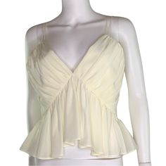 Nwot Lily Silk | Peplum Style Magnolia Silk Camisole Size: 8, Medium (See Photo For Sizing From Www.Lilysilk.Com) Color: Ivory Cream White (Manuf. Color, Lily White) Material: Silk Crpe De Chine Fabric Care: Hand Wash Cold, Line Dry, Cool Iron; Or Dry Clean. Description Add Effortless Femininity To Your Wardrobe With The Versatile Magnolia Camisole. Delicate And Demure Handcrafted Spaghetti Straps And A Plunging Neckline Are Thoughtfully Complemented By Elegant Silk And Playful Ruffles. Pair Wit Elegant Spring Blouse With Spaghetti Straps, Chic Fitted Spaghetti Strap Blouse, Chic Fitted Blouse With Spaghetti Straps, Elegant Spaghetti Strap Blouse For Spring, Chic Fitted Camisole With Ruffles, Elegant White Peplum Top For Summer, White Ruffled Straps Tops For Party, White Party Tops With Ruffled Straps, Fitted Peplum Top With Ruffles For Summer