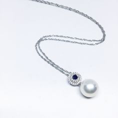 Our Unique Pendant Is Designed With White Freshwater Pearl , Cubic Zirconia And 925 Sterling Silver. You Can Wear It All Day Long. Jewelry : Pearl Pendant Pearl Type : Freshwater Pearl Pearl Grade : AAA+ Pearl Luster : High Pearl Body : Clean Pearl Shape : Round Pearl Nacre : All (100% nacre)  Necklace Length : 18 Inches = 45.7cm  Pearl Color : White/Pink/Gray/Black Pearl Size: Approx  7-8mm, 8-9mm, 9-10mm, *10-11mm , 11-12mm Clasp : 925 Sterling Silver Metal: Sterling silver Sterling Silver Chain: 18 inches Size Of Pendant : Approx  Length 20x 11mm Width *Nice Jewelry Box Wrap Thanks For Choosing Blest Jewellery :)   Blest Jewellery *Professional Jewellery Design  (since 2010)  Website: http://blestjewellery.yolasite.com online shop : www.etsy.com/shop/blestjewellery Facebook /Instagram s Fine Jewelry Pearl White Sterling Silver Necklace, Fine Jewelry Sterling Silver Necklaces In Pearl White, Fine Jewelry Sterling Silver Necklace In Pearl White, Fine Jewelry Pearl White Sterling Silver Necklaces, Timeless White Gemstone Necklace, Timeless White Sterling Silver Necklace, Luxury Sterling Silver Pearl White Necklace, Luxury Sterling Silver Necklace In Pearl White, Sterling Silver Pendant Pearl Necklace In Diamond White