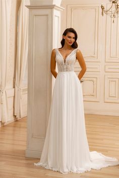 Elegant Chiffon A-Line Bridal Gown with Beaded Lace Bodice and Deep V-Neckline - WonderlandByLilian A Line Bridal Gowns, V Neck Wedding Dress, Sheer Overlay, Chiffon Skirt, Style And Grace, Lace Bodice, Bridal Gown, Beaded Lace, Deep V Neck