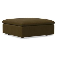 an ottoman that is brown and has a cushion on it