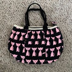 Cute And Spacious Cat Bag With Zip Closure Never Been Used Inside Has Two Pockets On On Side And One Zip Pocket On The Other, Outside Has A Zip Pocket On Each Side Comes With A Matching Pouch(Wallet) Bottom Measure 10”X6.5” Height 9.5” Pink Cat Design Shoulder Bag For Everyday, Casual Black Bags With Cat Design, Casual Black Bag With Cat Design, Trendy Black Bag With Cat Print, Everyday Black Bag With Cat Print, Casual Pink Shoulder Bag With Cat Design, Everyday Pink Bag With Cat Design, Trendy Pink Cat Design Bags, Black Everyday Bags With Cat Print