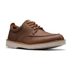 These Clarks men's Eastridge oxford shoes are a smart everyday choice. Made from pebbled leather, these lace-up shoes are designed for comfort with a cushioned sole and a flat sturdy heel. Wear them with pants or jeans. Closure Type: Lace-UpShoe Heel Height: 1 InchUpper/Outer Base Material: 100% LeatherShoe Lining Material: TextileSole Material Content: 100% EvaToe Type: Moc Toe, Closed ToeCare: Spot CleanHeel Style: Flat HeelCountry of Origin: Imported Oxford Leather Shoes With Goodyear Welt And Lace-up, Oxford Shoes Brown, Shoes Oxford, Shoes Brown, Lace Up Shoes, Pebbled Leather, Oxford Shoes, Heel Height, Men's Shoes