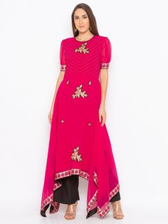 Indian/Pakistani Handmade Party Wear Ethnic Plus Size Pink Embroidered Readymade Asymmetrical Ready to Wear Stitched Georgette Kurta Indian Summer Wear Kurta / Indian Ethnic Kurti / Plus Size Net Kurta Dress Traditional Indian Wear / Festival Wear Designer / Party Wear Kurti / Women's Top / Ladies Shirt The set contains: 1 Kurta Kurta: pink Georgette asymmetrical long kurta with thread nad zari embroidered detail on upper body... elbow length sleeves gathered with fitted printed cuff at sleeves edge.printed border on the asymmetrical hemline with embr of resham and zari in the front..and peek a boo neckline at the back with black piping around it. Sleeve length : short sleeve Kurta Fabric: Georgette Fabric Care : Hand wash *Kurta Length : 48 inches* *We also provide customization of the ou Embellished Straight Kurta For Navratri, Pink Anarkali Kaftan For Navratri, Pink Anarkali Kaftan For Festive Occasions, Festive Kaftan With Dupatta For Eid, Georgette Kaftan With Resham Embroidery, Festive Chanderi Kaftan For Parties, Traditional Embellished Chanderi Kaftan, Festive Zari Work Georgette Kaftan, Festive Transitional Kaftan With Resham Embroidery