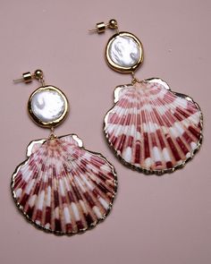 Dress up your beach look with these classy pearl shell earrings! Made with real shells and gold plating, they add the perfect touch of vacation style. (Shell-ebrate the seaside!) 18k gold-plated, Shell, Fresh Water Pearl Lightweight | hypoallergenic | 2" drop Handmade in Los Angeles Follow these tips to keep your jewelry looking its best! Luxury Pearl Shell, Shell Earrings Large, Shell Jewelry Luxury, Shell Jewelry Pearl, Jewelry Made From Sea Shells, Summer Beach Earrings, Real Shell Jewelry, Handmade Shell Jewelry, Sirencore Jewelry