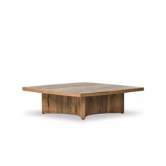 the square table is made from wood and has an open end on one side, with two