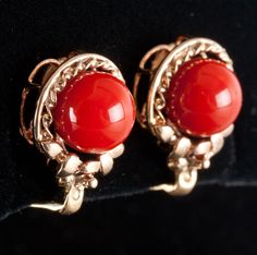 Vintage 1960's 18k Yellow Gold Natural AAA Red Coral Necklace Earring Set 57.37gMetal Information: 18k Yellow GoldTotal Weight: 57.37gNecklace Width: 12mm - 6.1mmNecklace Length: 25"Earring Dimensions: 18mm x 12.8mmCirca: 1960'sStone InformationMain StoneGem Type: CoralShape: Round Bead (12mm - 6.1mm)Color: RedClarity/Quality: AAANumber of Stones: 79Accent StonesGem Type: CoralShape: Oval Cabochon (18mm x 8.2mm)Color: RedClarity/Quality: AAANumber of Stones: 1Estimated Retail Price: $7690.00OUR Red Coral Necklace, Coral Necklace, Red Coral, Oval Cabochon, Necklace Earring Set, Round Beads, Earring Set, 1960s, Coral