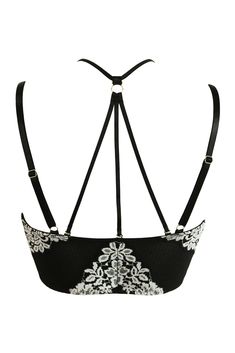 UnderwiredNon-paddedLongline bralette shapeFront fastening hook and eye detailsBeautiful two-tone floss laceRacer-back styleAdjustable strapsWorn to be seenDecorate your body in luxurious lace with the India Two-Tone Floss Front Fastening Bralette. This underwired, racerback style features a supportive and stylish hook-and-eye fastening as well as adjustable straps. Worn as a beautiful set or worn to be seen with your favourite jeans or skirt, this tantalising non-padded bralette can be more sty Party Lace Bra With Removable Pads, Fitted Lace Bra With Spaghetti Straps, Lace Trim Evening Bra, Party Bra With Lace And Spaghetti Straps, Lace Underbust Bra With Lace Closure, Underbust Bra With Lace Closure, Party Bra With Lace Closure, Lace Underwire Corset With Straps, Lace Corset With Underwire And Straps