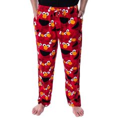 These are Officially Licensed Sesame Street Elmo Pajamas. Sesame Street is one of the best-known children's tv shows of all-time and has encouraged generations of us to live, learn, and love with characters like Cookie Monster, Big Bird, Snuffleupagus, Grover, and Oscar The Grouch! This lounge pant features an allover print of Elmo making different expressions. Each lounge pant is made of ultra-soft Polyester fabric that will have you wanting to wear them and snuggle up to listen to watch a good Elmo Pajama Pants, Elmo Pants, Elmo Pajamas, Mens Pyjama Bottoms, Plush Pajama Pants, Luxury Stuff, Sesame Street Elmo, Childrens Tv, Oscar The Grouch