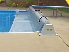 an above ground swimming pool is shown with the cover pulled down to protect it from falling