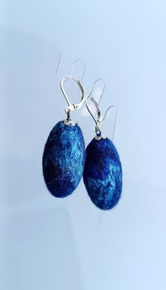 Felt blue oval earrings - wool felt balls jewelry.    I offer handmade felt earrings of my own design! They are made by me in my own way, which includes both dry felting and wet felting. And I also used incredibly soft natural sheep's wool and valuable plant fibers, such as flax, nettle, viscose, silk, proven bijouterie metal fittings. Earrings of a perfect dense shape, decorated with a fibrous pattern. Each made felt ball is unique and unrepeatable. The color of the earrings in the photo: blue Felt Earrings, Dry Felting, Felted Earrings, Wool Felt Balls, Handmade Packaging, Felt Balls, Oval Earrings, Light Earrings, Oval Earring