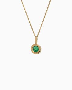 Crafted in 14K solid gold, the Princess Petroglyph Stone Pendant features a faceted green zircon stone encircled by intricate petroglyphs. Its unique design adds a touch of elegance to any outfit, and pairs wonderfully with our Princess Petroglyph Stone Studs. Metal: 14K solid gold Stone: Green zircon Dimensions: 16mm x 8mm Stone Size: 8mm Style #: GP160GZ Hook Bracelet, Stone Studs, Gold Piece, Handmade Design, Stone Pendants, Solid Gold, Unique Designs, Sterling Silver, Stone