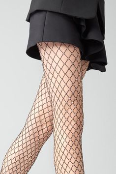 Seamless diamond fishnets with a twist. Classic black medium size fishnet tights accented with crystals throughout, for an edgier look. Party Legwear In Fishnet Mesh, Party Fishnet Legwear, Black Mesh Hosiery For Party, Fishnet Tights For Party, Black Mesh Party Hosiery, Party Fishnet Mesh Legwear, Party Fishnet Legwear In Mesh, Party Fishnet Mesh Tights, Fishnet Mesh Tights For Party