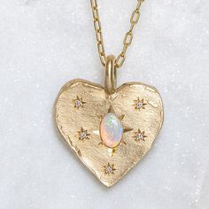 Our Big Heart pendant has been set with a South Australian crystal opal surrounded by stars of G/VS diamonds. Heart measures 20.5 x 19.5mm Elongated trace chain measures 45cm. Please note, we will match the opal as close to the image as possible. Each opal is unique and may vary in appearance and colour from what is depicted on the site. Big Heart Necklace, Crystal Opal, Vs Diamond, Silver Heart Necklace, Opal Crystal, Opal Pendants, Big Heart, Opal Necklace, Chain Pendants