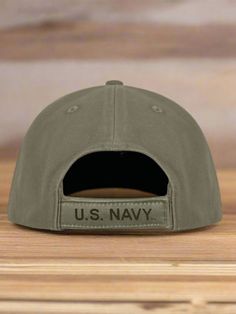 Top quality, low profile US Navy cap made of 100% cotton twill with sewn vent eyelets. Adjustable, one size fits all. Officially licensed by the USN. Available in 2 options (select from dropdown menu above): OPTION A: Traditional, regulation navy blue with embroidered gold NAVY insignia, OPTION B: Deluxe, olive drab (ODG) with 2-tone black embroidered USN "Eagle with Anchor" insignia plus "U.S. Navy" embroidered onto both the brim and the back. Cushioned headband. COMMENTS: For more USN items in Military Style Khaki Cotton Baseball Cap, Khaki Cotton Military Baseball Cap, Navy Insignia, Navy Peacoat, Ditty Bag, Navy Cap, Sea Bags, Option B, Watch Cap