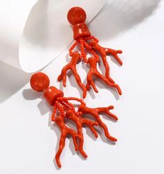 Perfect for summer time or tropical vacation! coral style earrings Summer Beach Coral Jewelry, Coral Jewelry For Summer Beach Occasions, Orange Earrings For Beach In Summer, Orange Earrings For Summer Beach Outings, Orange Earrings For Summer Beach, Orange Earrings For Summer Beach Occasion, Orange Summer Earrings For Vacation, Trendy Red Jewelry For Vacation, Trendy Dangle Earrings For Vacation