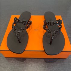 100% Authentic Hermes Island Sandals. Black. Size 39. With Box And Dust Bags. Rubber. Brand New!!! Rubber Sandals, Hermes Shoes, Sandals Black, Black Sandals, Women's Shoes Sandals, Shoes Sandals, Dust Bag, The 100, Women Shoes