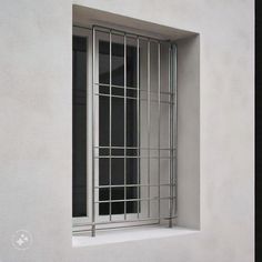 a window with bars on the side of it