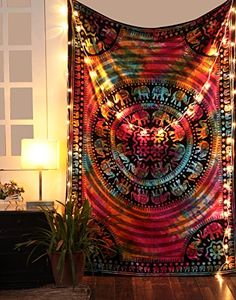 a tapestry hanging on the wall in a room