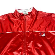 Red Sports Outerwear With Pockets, Casual Red Sport Coat For Streetwear, Red Retro Track Jacket For Outdoor, Retro Red Track Jacket For Outdoor, Red Retro Outerwear With Pockets, Vintage Red Track Jacket For Outdoor, Retro Red Outerwear With Pockets, Retro Red Hooded Outerwear, Red Retro Windbreaker With Pockets