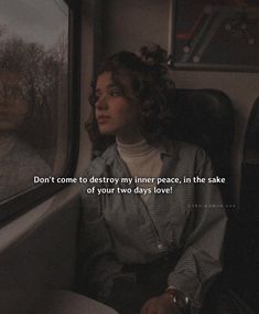 a woman sitting on a train looking out the window with a quote written above her