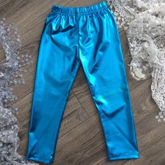 Adorable Girls Shiny Blue Pants Will Glitz Up Any Outfit! Casual Blue Footless Leggings, Blue Stretch Pants With Elastic Waistband, Blue Casual Footless Bottoms, Casual Blue Footless Bottoms, Shiny Pants, Girls Boutique, Blue Pants, Pants Color, Kids Bottoms