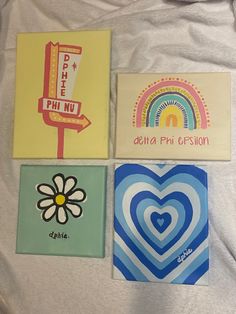 four different greeting cards on a white sheet