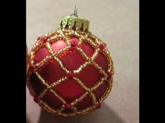 a red ornament sitting on top of a table