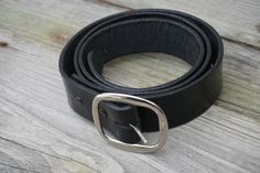 Standard Black Leather Belt. Appropriate for all occasions. Guaranteed for life. If it ever breaks, fades, or just needs a good once over, send it back to me with proof of purchase and I will repair, renew or replace it free of charge, no questions asked. I guarantee this belt for life.  Please send me your actual waist size in inches as the retail market likes to make up their own standard on sizes. Thank you. -Evolution Leather Retail Market, Black Leather Belt, Suspender Belt, Black Belt, Suspenders, Waist Size, Leather Belt, Belts, Black Leather