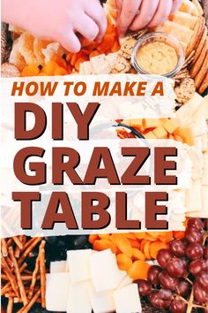 someone making a diy graze table with cheese and crackers