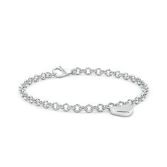 The heart-shaped charm on this 14k white gold bracelet bespeaks romantic love and classic elegance. This charm bracelet looks just as chic worn solo as it does layered with other bracelets. Classic Sterling Silver Bracelet With Charms, Elegant White Gold Heart-shaped Chain Bracelet, Elegant White Gold Heart Pendant Bracelet, Elegant White Gold Heart Bracelet With Charm, Classic White Gold Jewelry With Heart Charm, Elegant Everyday Sterling Silver Bracelet With Heart Charm, Elegant Sterling Silver Bracelet With Heart Charm For Everyday, Elegant White Gold Charm Bracelet For Valentine's Day, Elegant Everyday Heart Bracelet With Charms