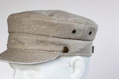 Handmade linen summer caps sewn using old technology without synthetic fabrics inside of the cap. Due to this, the linen cap is breathable and perfect for hot summer days Classic model of newsboy cap is unisex, so it will fit on both men and women. 100% linen, not dyed. 100 % cotton lining. Plastic is used for the brim of the cap, so you can wash it as much as you need. Eyelets - stainless steel SIZE: please coose from drop down menu US Size - 7 1/8, could be reduced to 7, (57-56cm) US Size - 7 Linen Flat Cap For Summer, Summer Linen Flat Cap, White Scrunchie, Blue Scrunchie, Wrist Accessories, Old Technology, Summer Cap, Linen Summer, Hand Wrist