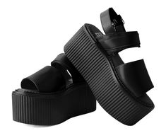 The higher the platform, the better. Features a brush off PU upper on our lightweight VIVA stratocreeper sole that has a platform height approximately 3” at the heel and 2.5” in the front. Includes removable memory foam padding for extra comfort. Sandals Platform, Black Platform Strapped Sandals, Black Chunky Platform Sandals, Edgy Black Platform Sandals, Black Chunky Platform Sandals In Synthetic, Black Chunky Platform Synthetic Sandals, Alt Shoes, Chunky Platform Sandals, Platform Wedges Shoes