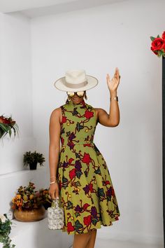 This Zuri African Print High Neck Dress is a sophisticated and stylish addition to your wardrobe. Made from high quality African print fabric, it offers a unique blend of comfort and fashion. The high neck design adds a touch of elegance, making it suitable for both formal and casual occasions.   FEATURES * 100% African Wax Cotton * Back zipper * Dress is Lined with length 43'' * Model Is Wearing A Size Small and Height is 5'9                              CARE INSTRUCTION * Hand Wash in Cold Wat Back Zipper Dress, African Fabric Dress, African Print Clothing, African Wear Dresses, African Print Dress Designs, Gold Sequin Dress, High Neck Designs, Zipper Dress, African Print Dress