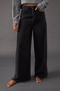 Turn heads in these so special slouchy jeans from our We The Free collection featured in a high-rise, wide-leg silhouette with super exaggerated wide legs for forever effortless style no matter the occasion. Raw bottom hem Five pocket style Button-front closure Style note: For a low-slung, slouchy look, we suggest sizing up 1 size. Care Machine Wash Cold Measurements for size 28 Regular inseam: 30.5 in Rise: 13.75 in Short inseam: 28.5 in Waist: 30 in Hips: 29.5 in Slouchy Jeans, Jeans Free People, Cropped Denim Jacket, Trend Forecasting, Old West, Wide Legs, Cropped Denim, Short Pants, Panther