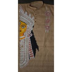 an embroidered shirt with a woman's face on the front and two other designs on the back